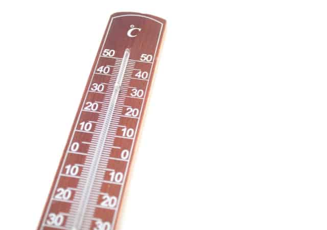 Room thermometer on white background